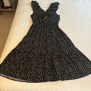 Banana Republic black flowy dress with small flowers. Size Medium.